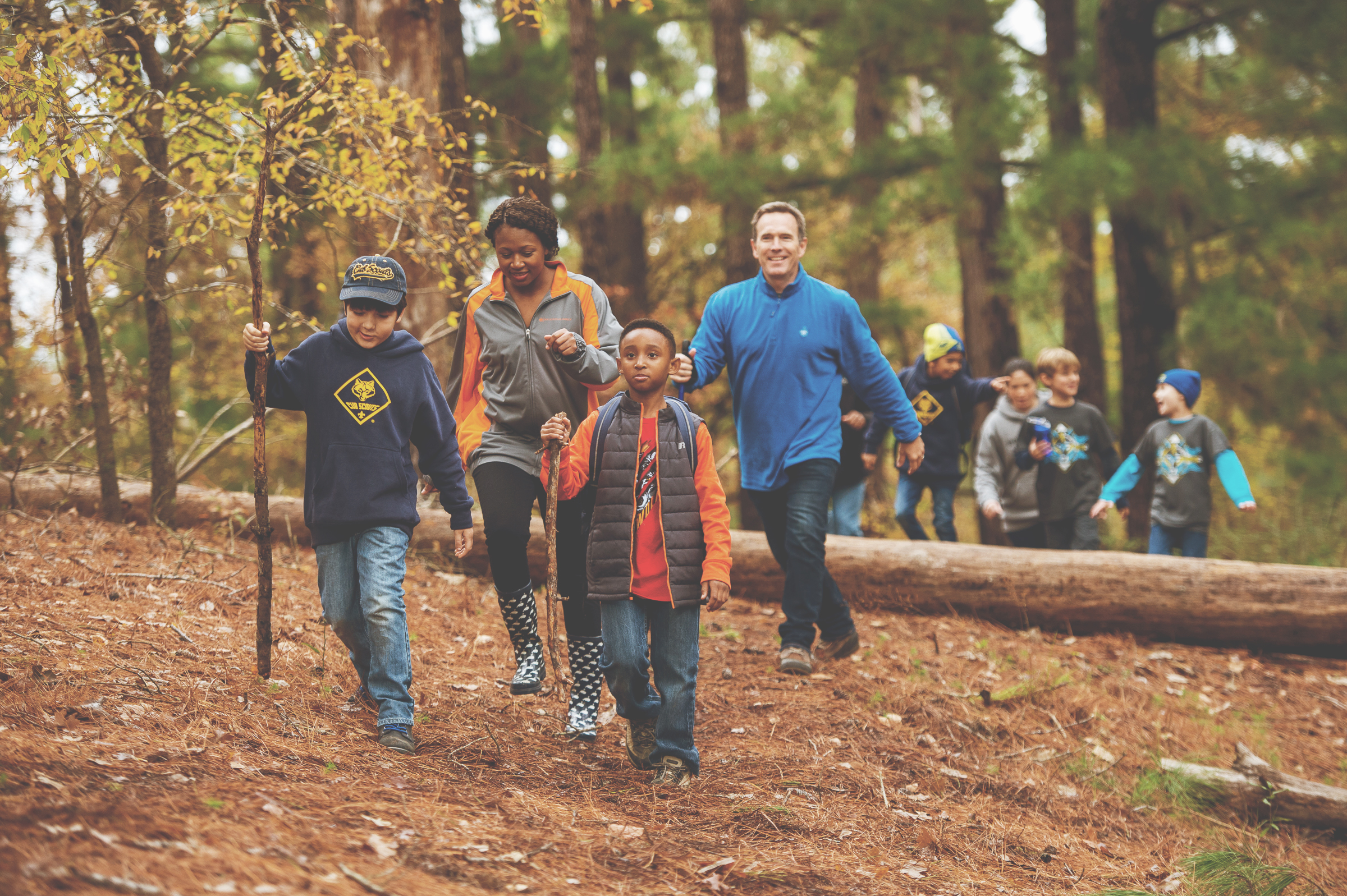 Scouts and adults hiking outdoors